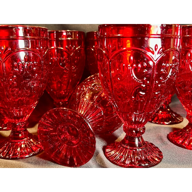 Set of 12 Fitz and Floyd red glass goblets. In excellent shape, rarely used.