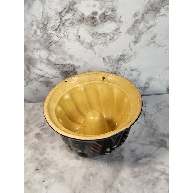 19th century French glazed earthenware kouglof cake mold from the Alsace region in Northern France, circa 1880s. Used to...