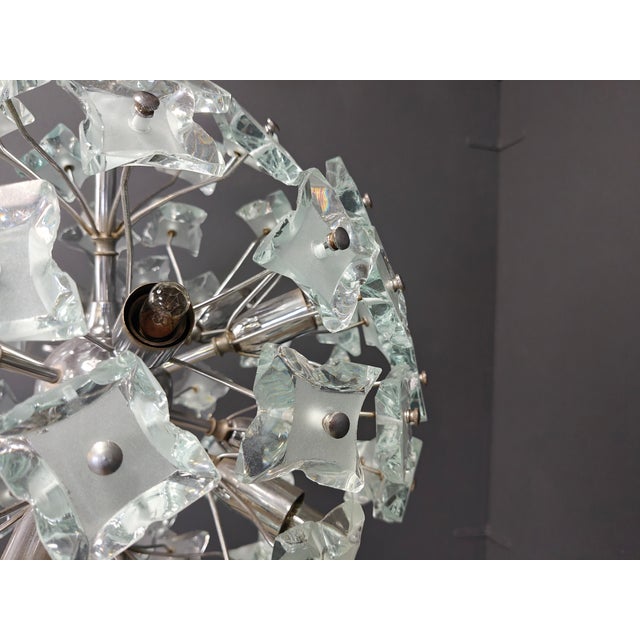 Brutalist Sputnik Chandelier in Glass, 1970s, in Good conditions. Designed 1970 to 1979 European Plug (up to 250V).The...