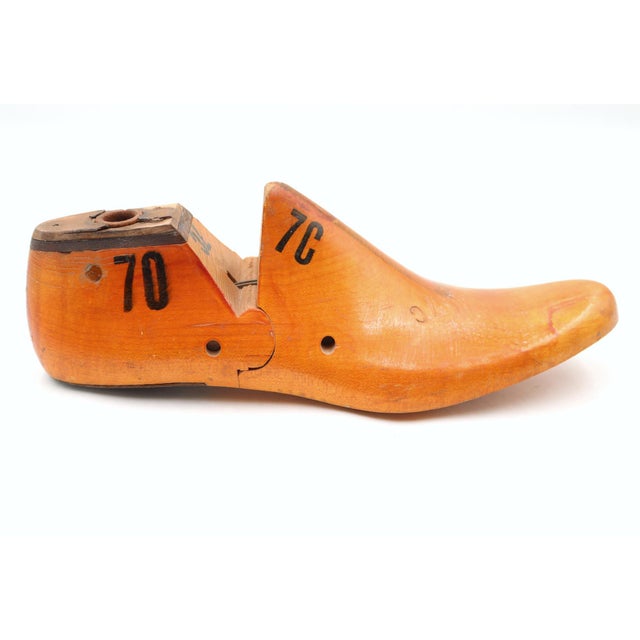 The last or form is made of solid wood and has a medium stain once used by cobblers. The text "FEB 9 1956, 70" is stamped,...