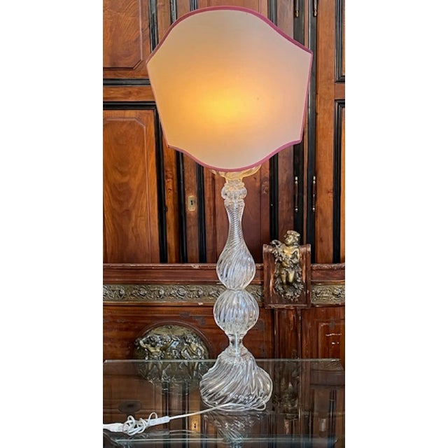 Floor lamp, table lamp with Antonio Seguso's engraved signature. The lamp is in a classic style with a torchon finish....