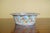 A decorative antique Chinese export famille rose reticulated porcelain basket bowl featuring pierced openwork sides,...
