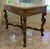 Custom Hamilton Inc. 518S 38”L x 24”D x 27”H Wood table w/Costillo/Country Distress finish. 38”L x 24”D x 1”H Fossil Stone...