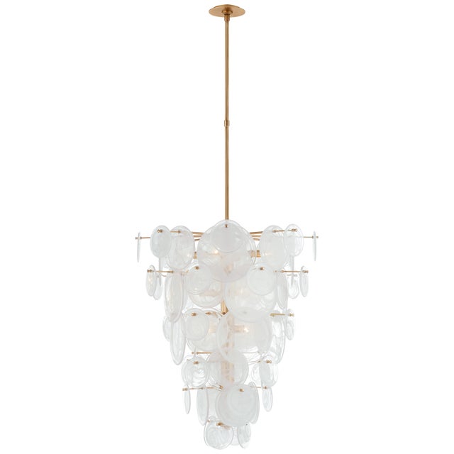 Loire Cascading Chandelier in Gild with White Strie Glass Designer: AERIN Fixture Height: 35.75" Min. Custom Height: 40"...