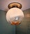 Large ceiling light composed of a chromed metal base and a murano glass globe, produced by the italian manufacturer...
