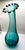 A striking hand‑blown studio art glass vase, signed Eastern, featuring a sculptural ruffled rim with applied cobalt tips...