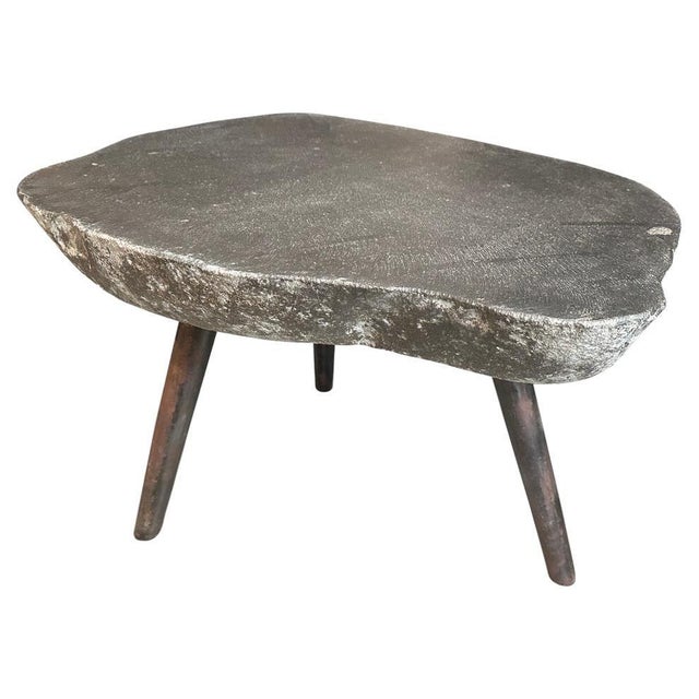 River stone side table from the Ayung River on the island of Bali. We added charred metal legs and polished the top. The...