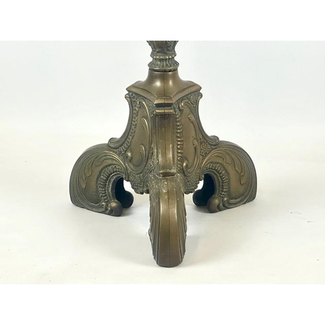 The candlestick is in the neo-baroque style. It propably comes from one of the french bronze foundries from the second...