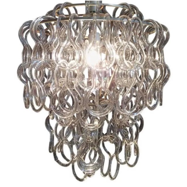 Incredible Giogali 50 pendant chandelier. Beautiful hand blown Murano loops that interlock. Designed by Angelo...