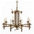 A vintage Hollywood Regency style eight light chandelier in bronze faux bamboo form. The chandelier features eight...