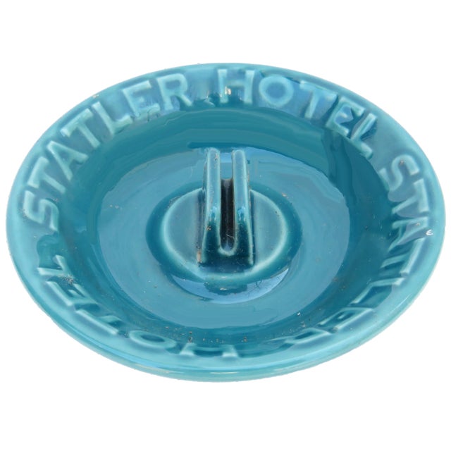 This vintage matchbook holder / ashtray recalls a golden age of the hospitality trade. One of the earliest American hotel...