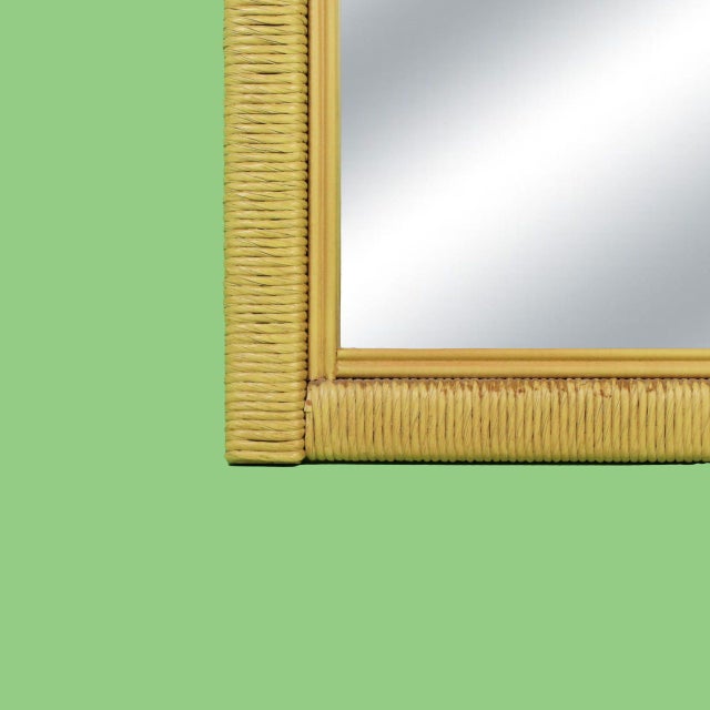 Reflect light and style with this vintage Henry Link wicker rattan mirror. The quality craftsmanship and natural rattan...