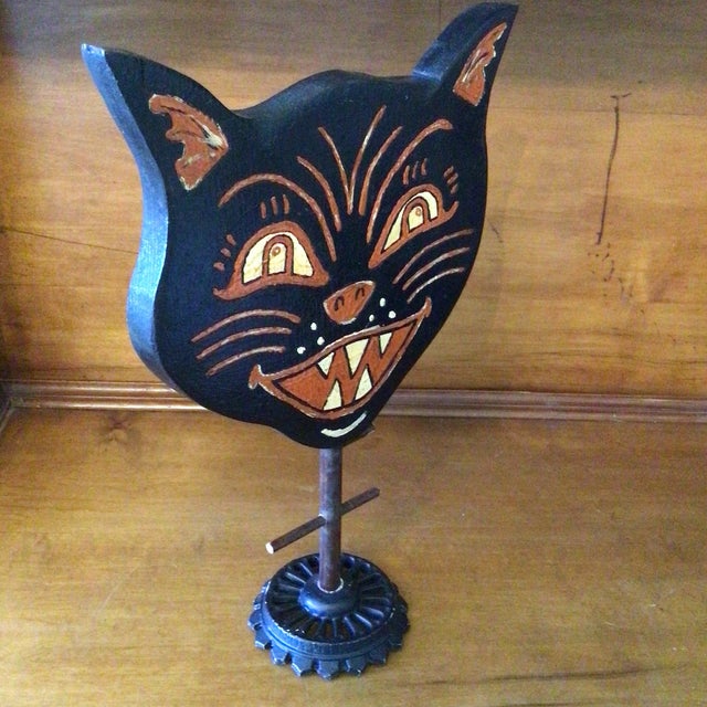 Victorian style one of a kind Halloween cat made from pine on an iron base by a California folk artist. Signed by...