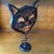 Victorian style one of a kind Halloween cat made from pine on an iron base by a California folk artist. Signed by...