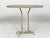 Sculptural coffee table in the style of Meret Oppenheim, France, 1980s, construction made of brass in a gold color,...