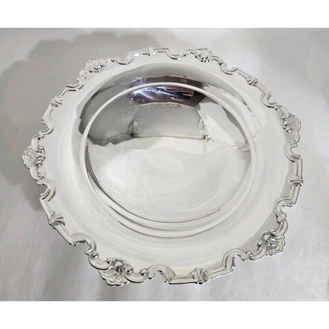 A fine vintage sterling silver cake compotier, tazza or bon bon dish dating to 1965, displaying elegant traditional...