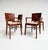 Elegant set of 4 chairs produced by Andreu World. The armchairs have a sculptural stained maple wood frame, a plywood...