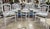 Create a timeless and inviting dining space with this beautiful set of eight vintage French Country dining chairs....
