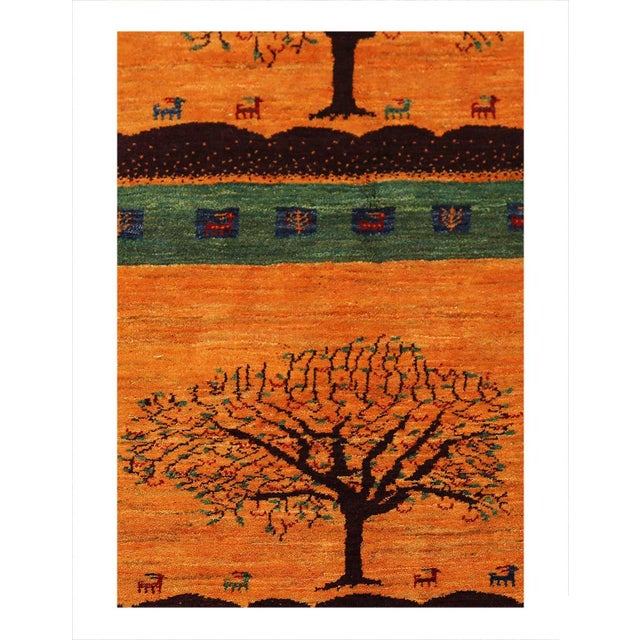 Gabbeh rugs are made by the nomadic Qashqai tribes of southern Azarbayjan. They are rough cut and long piled rugs of rich...
