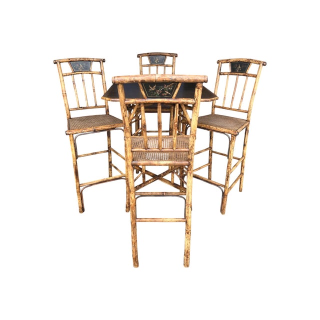 This striking pagoda-style Chinoiserie bamboo table and stool set is crafted from genuine bamboo, showcasing exceptional...