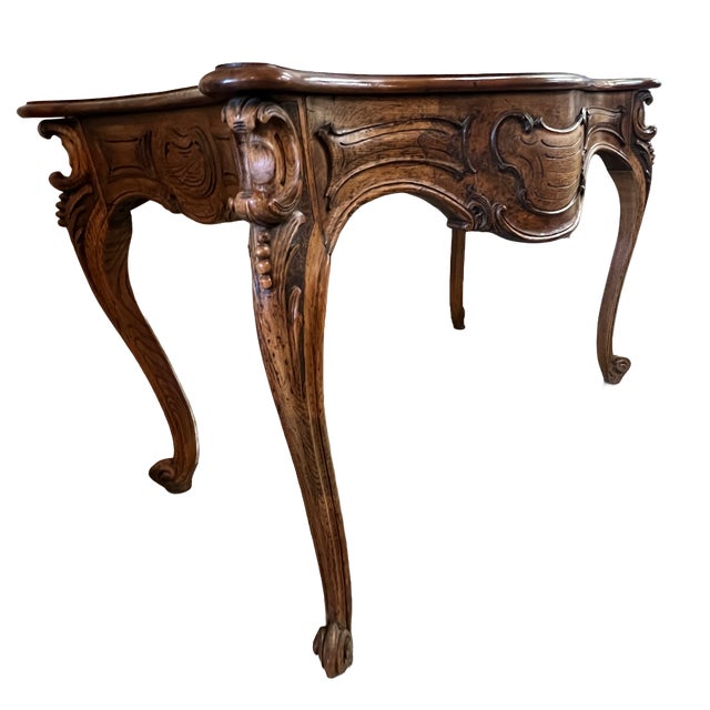 Beautiful turn-of-the-century hand-carved console table with French-style legs. 30.5"h x 43"w x 23"d