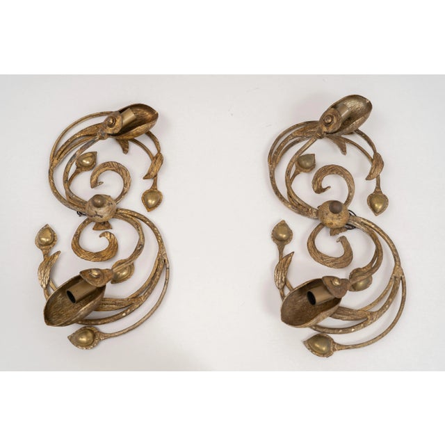 Pair of bronze wall lights. The lights are made out of bronze and iron. European Plug (up to 250V).The wiring of this item...