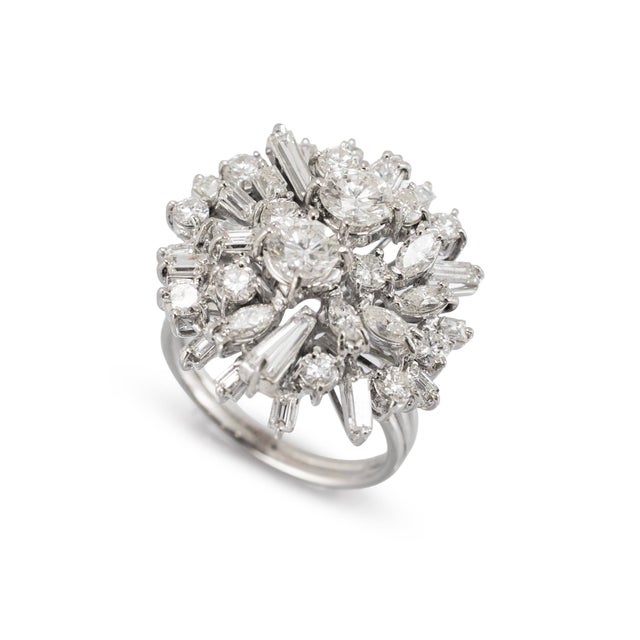 Gender: Ladies Metal Type: 18K White Gold Size: 5 Weight: 7.30 grams Ladies 18K white gold vintage, diamond cluster,...