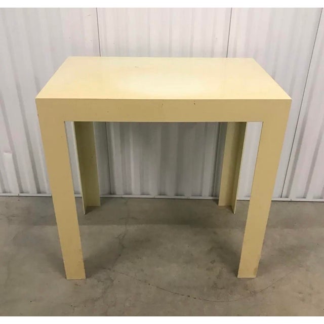 Highly stylistic molded plastic parsons table in the style of Syroco or Kartell. One piece of molded plastic, no seams or...