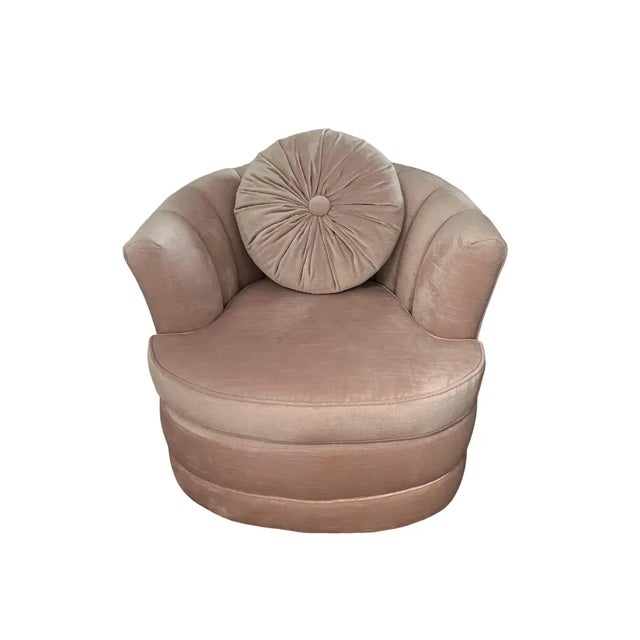 Matching Pair of Hollywood Regency Channel Back Swivel Chairs & ebonized walnut base upholstered in "Beverly Hills Pink"...