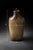 A large-scale studio pottery vessel with a rich earth-tone glaze and subtle dragonfly etching—an organic, sculptural...