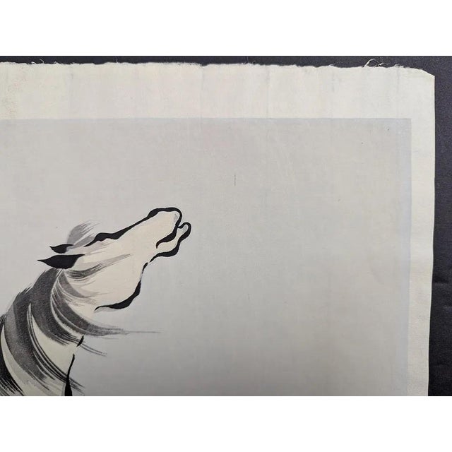 A striking original Japanese woodblock print by Yoshijiro Urushibara (1889–1953), also known as Mokuchu Urushibara,...