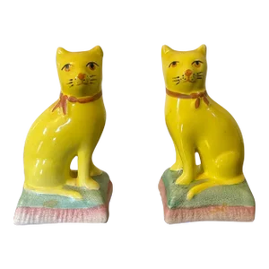 Antique 19th Century English Staffordshire Canary Yellow Cats - a Pair