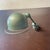 Beautiful original painted green Jielde single smaller arm wall light. Designed by the French engineer, Jean-Louis Domecq,...