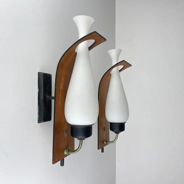 These remarkable wall lights, crafted by Stilnovo in Italy during the 1950s, not only exemplify exquisite design but also...
