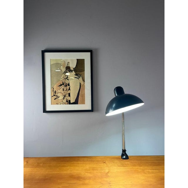 This iconic Bauhaus-era clamp lamp was designed by the renowned designer Christian Dell. Created for the manufacturer...