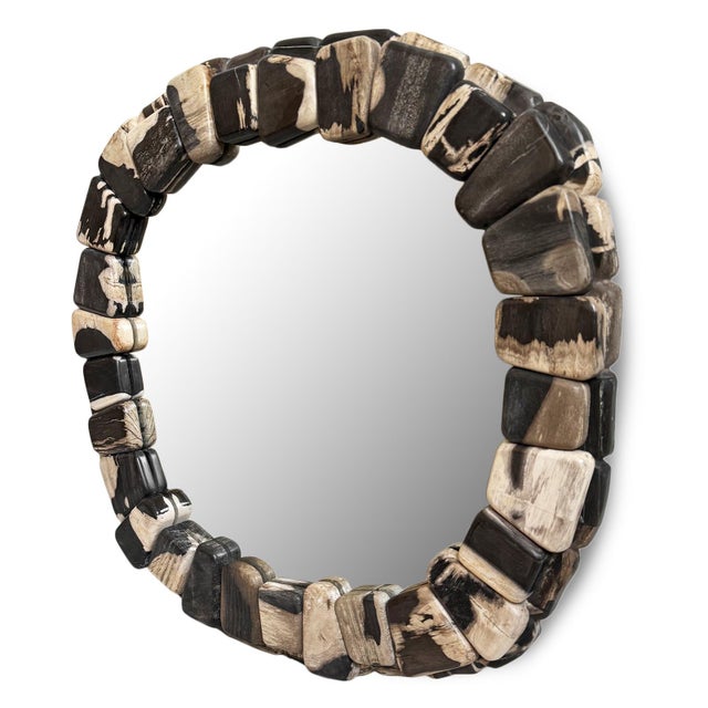 Genuine petrified wood pebble wall mirror. Each individually polished stone showcases the remarkable mineralization and...