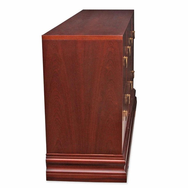 This piece is a modern mahogany dresser that could also be used as a credenza. This has ample storage and is in very good...