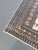 This hand-knotted Iranian Yazd rug features a sophisticated color palette of ivory and subtle off-grey tones. Designed...