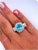 Vintage Retro Style 8 Carat Oval Cut Blue Zircon with Diamond Halo in Platinum &, Size 8.25 For Sale In Miami - Image 6 of 7