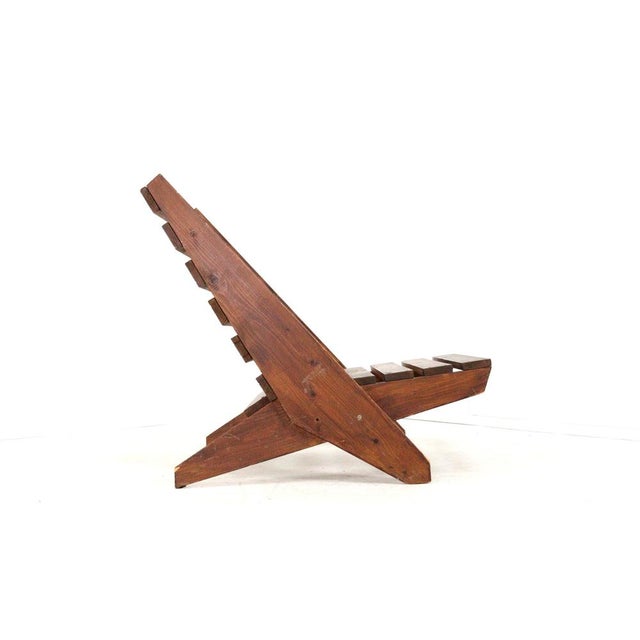 This exceptional mid-century style lounge chair combines a powerful sculptural design with a surprisingly practical...