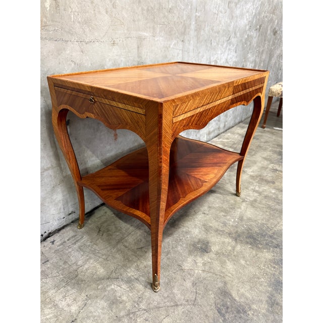 Antique Louis XV inlaid parlor table with pull-out slides, France, circa 1880s. This elegant late 19th-century French...