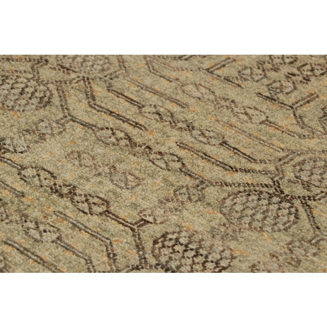 Hand-knotted in wool, this 2x3 gift-sized rug is inspired by antique Khotan Samarkand rugs of East Turkestan, known to...