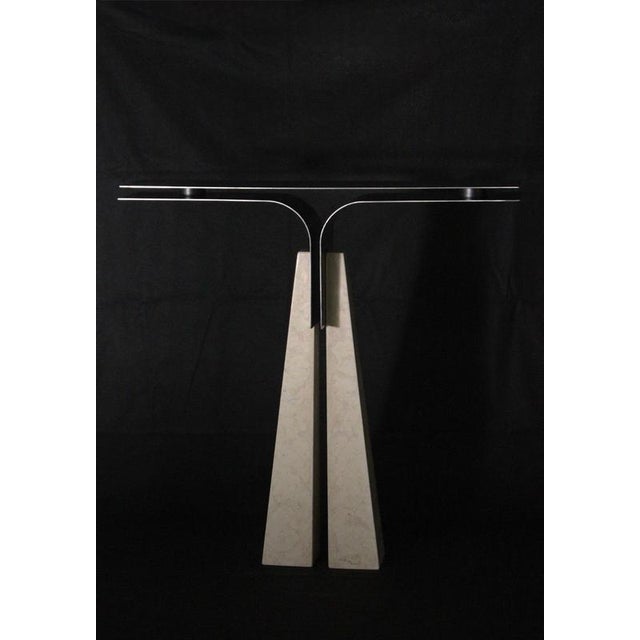 Prisma console table in trani marble & curved iron by d´ark atelier one of a kind dimensions: d 25 x w 120 x h 110 cm....
