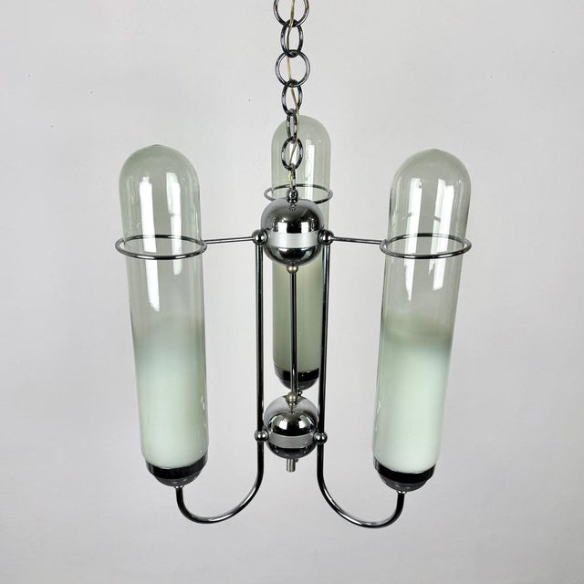 Mid-Century Modern Murano Glass Torpedo Chandelier attributed to AV Mazzega, Italy, 1960s This piece is attributed to the...