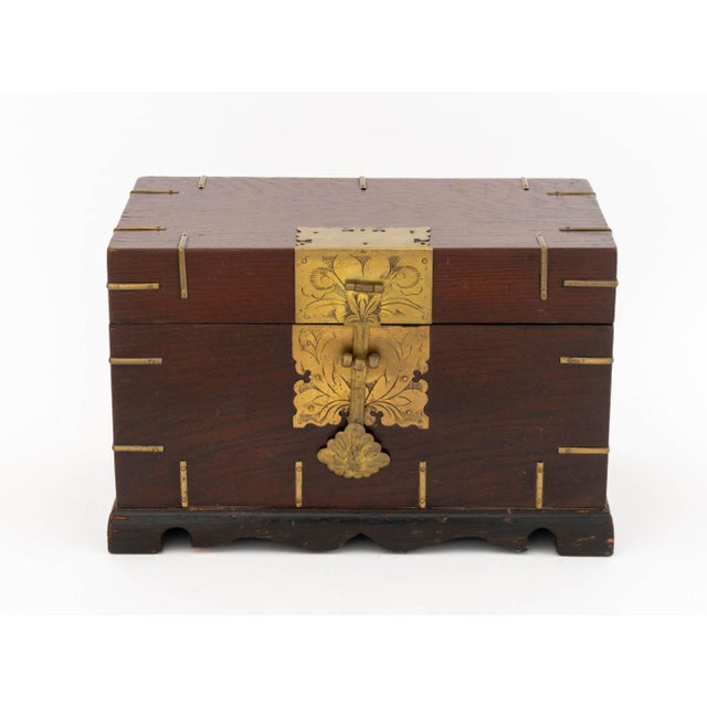 Chinese Brass Mounted Elm Chest, the cover opening to removable tray and storage compartment. 10.25" H x 16.25" W x 9.5"...