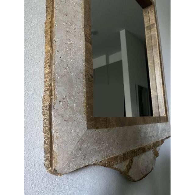 A very stylish vintage mirror in the Maitland Style design with tessellated stone finish. It has a special colored stone...