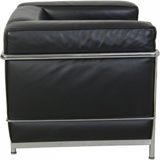 Le Corbusier LC2 chair upholstered in black leather and with a chrome frame. The chair is from the 2000s and appears in...