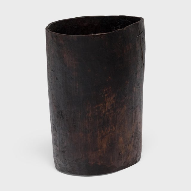 This rustic wooden container dates to the mid-19th century and was once used to store dry goods or household items in a...