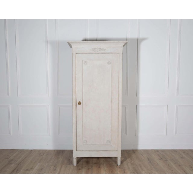 This elegant Swedish linen closet, crafted circa 1890, is a beautiful example of late 19th-century Scandinavian...