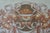 Fresco, original tear on canvas, removed from an early 20th-century home, depicting a face with floral elements....